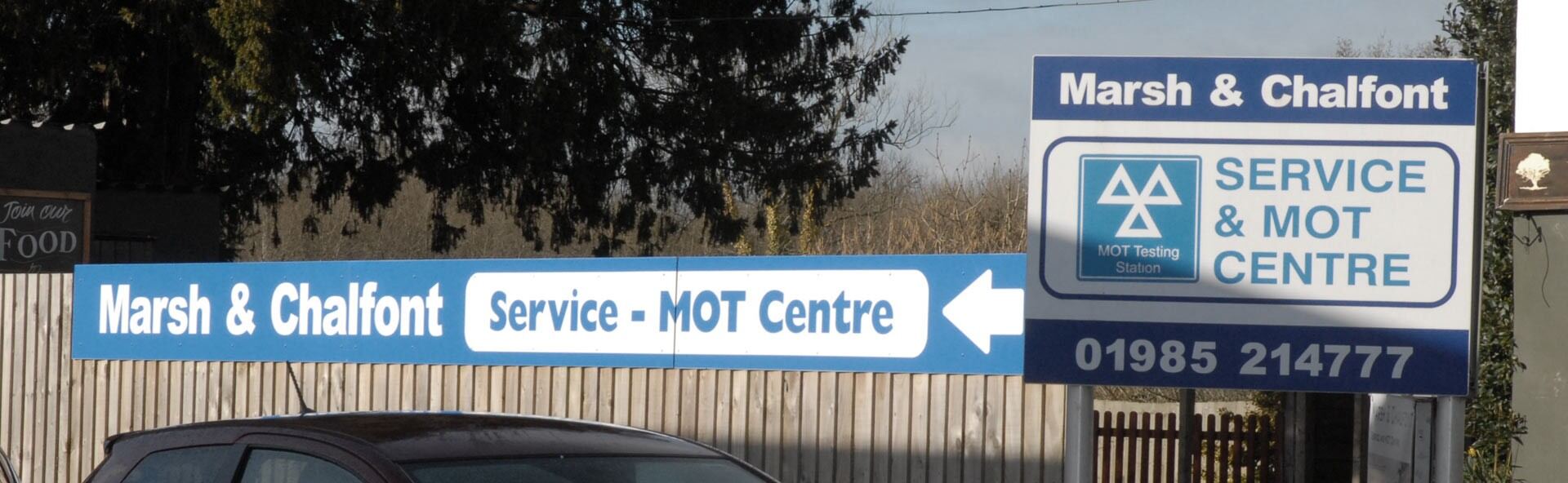 Marsh & Chalfont Service and MOT Centre road signs on Boreham Road, Warminster